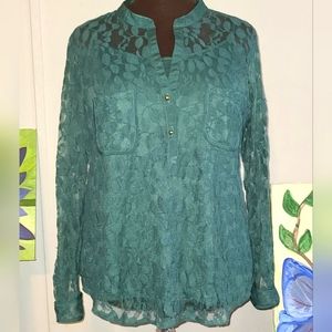 Blouse pretty shade of green.